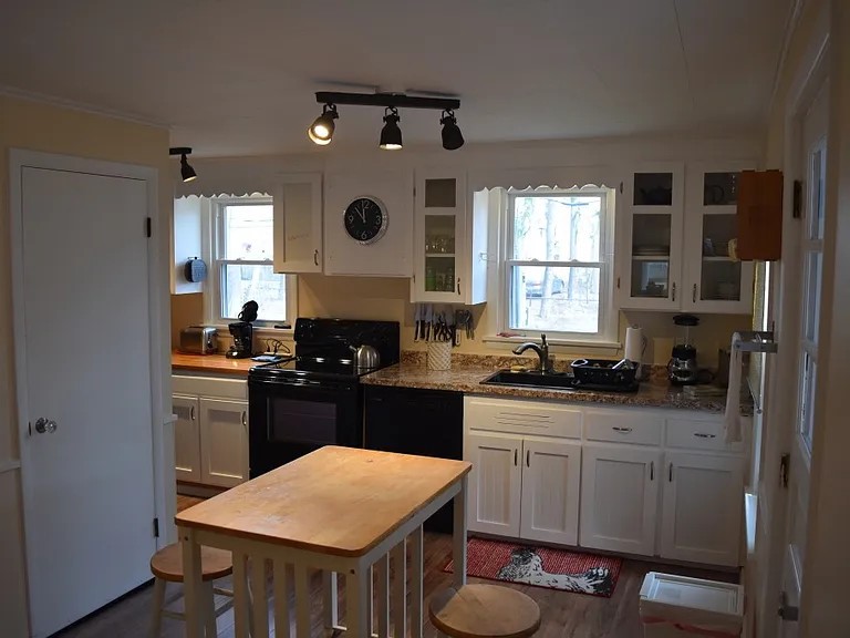 16 Whalin Street Rochester, NY 14620 - Photo 24 of 38 Kitchen area - basement entrance on left rear door