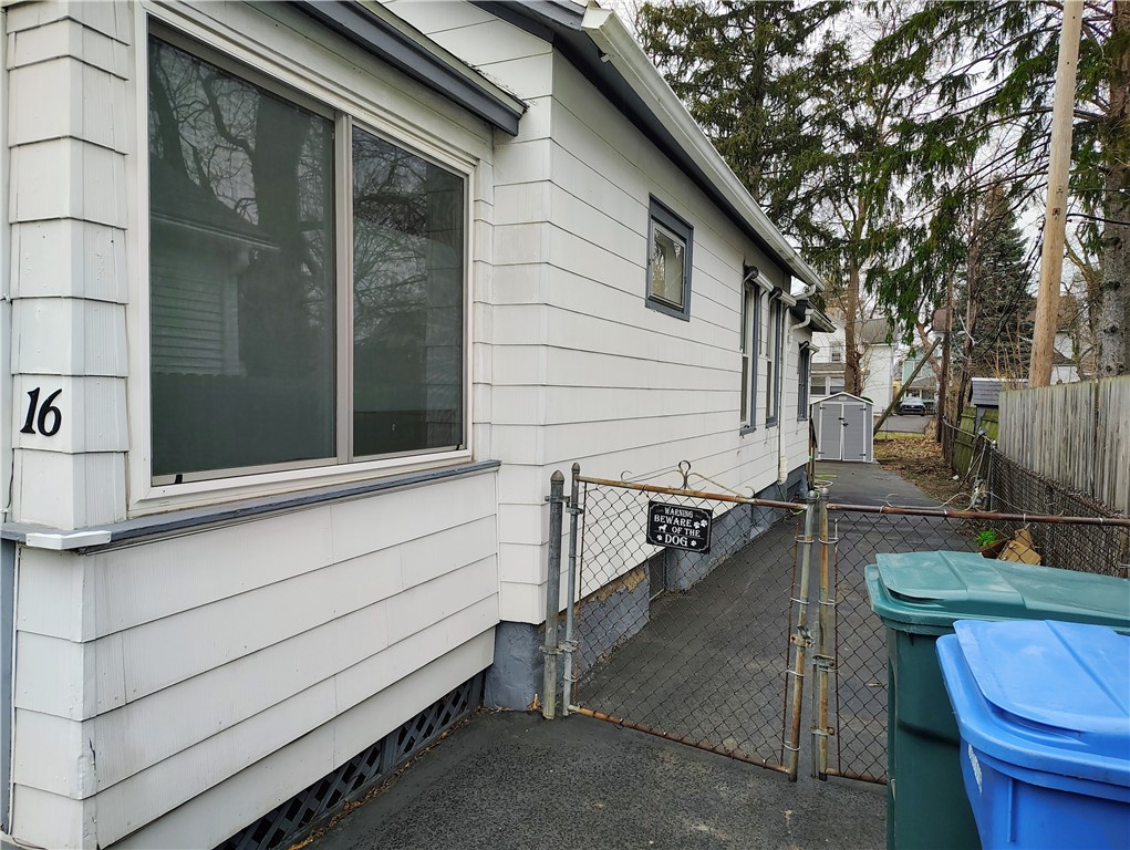 16 Whalin Street Rochester, NY 14620 - Photo 7 of 38 Down south side of house driveway