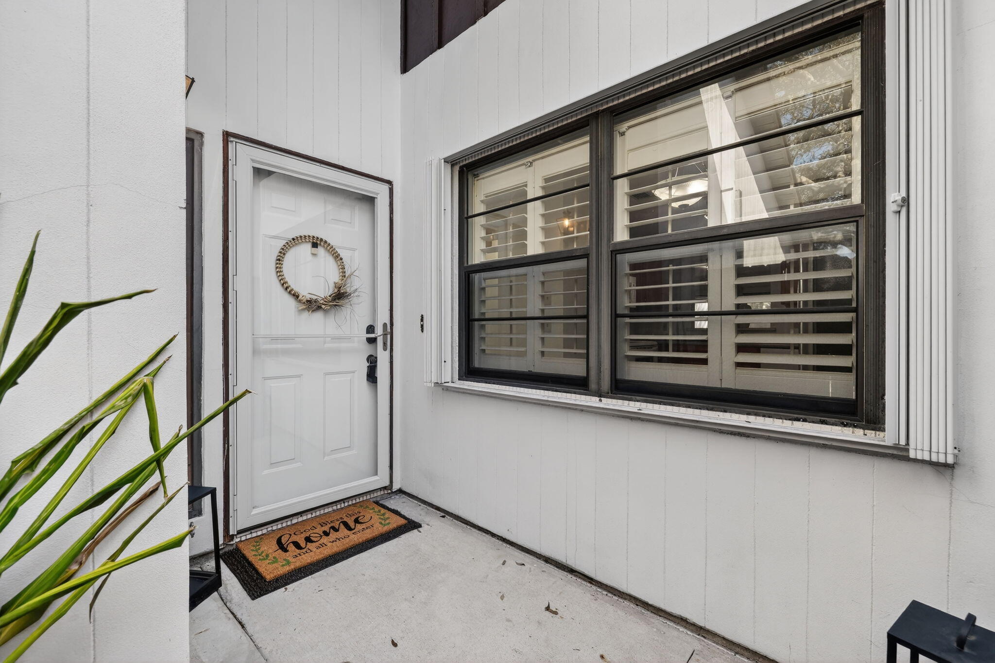 2090 Colonial Road, Unit 5 Fort Pierce, FL 34950 - Photo 14 of 17 Storm Door Entry & Shutters