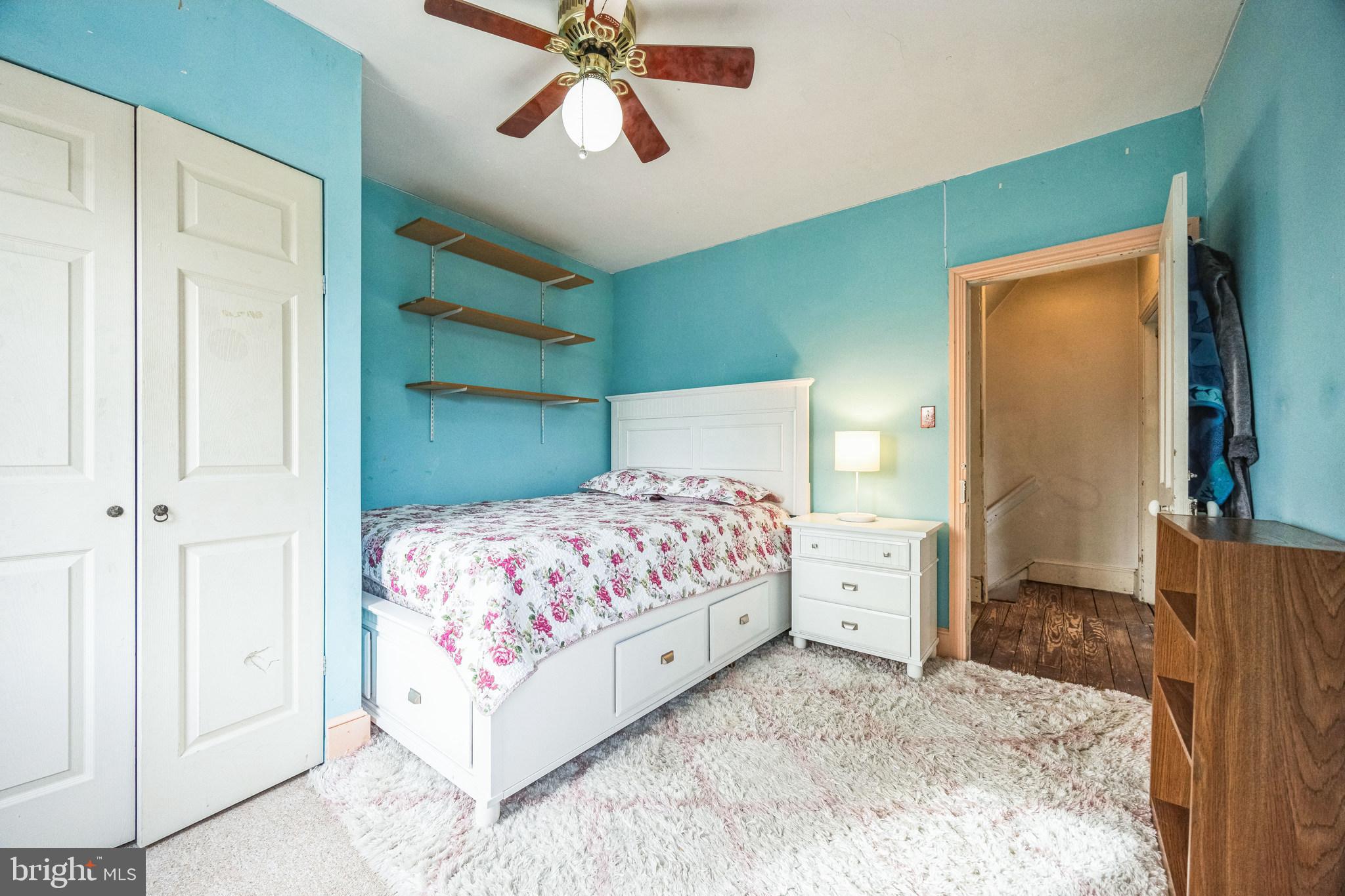 21 Hartford Road Mount Laurel, NJ 08054 - Photo 19 of 26 a bedroom with a bed and a chandelier