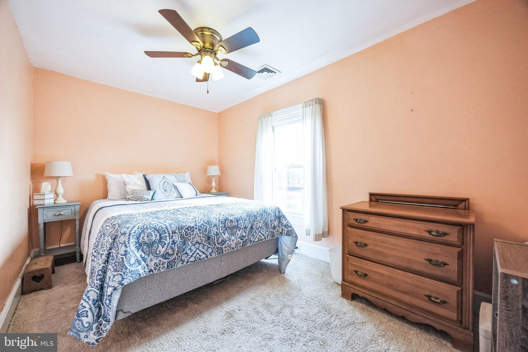21 Hartford Road Mount Laurel, NJ 08054 - Photo 20 of 26 a bedroom with a bed and a dresser