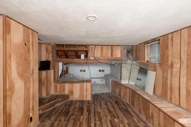 a view of a kitchen from the hallway
