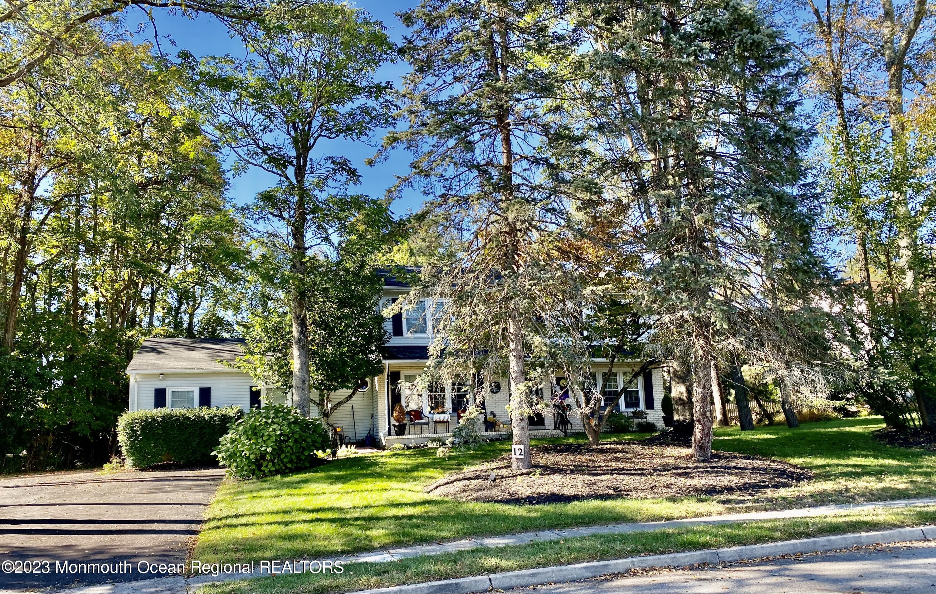 12 Spicy Pond Road Howell, NJ 07731 - Photo 1 of 19 a view of a house with a yard and tree s
