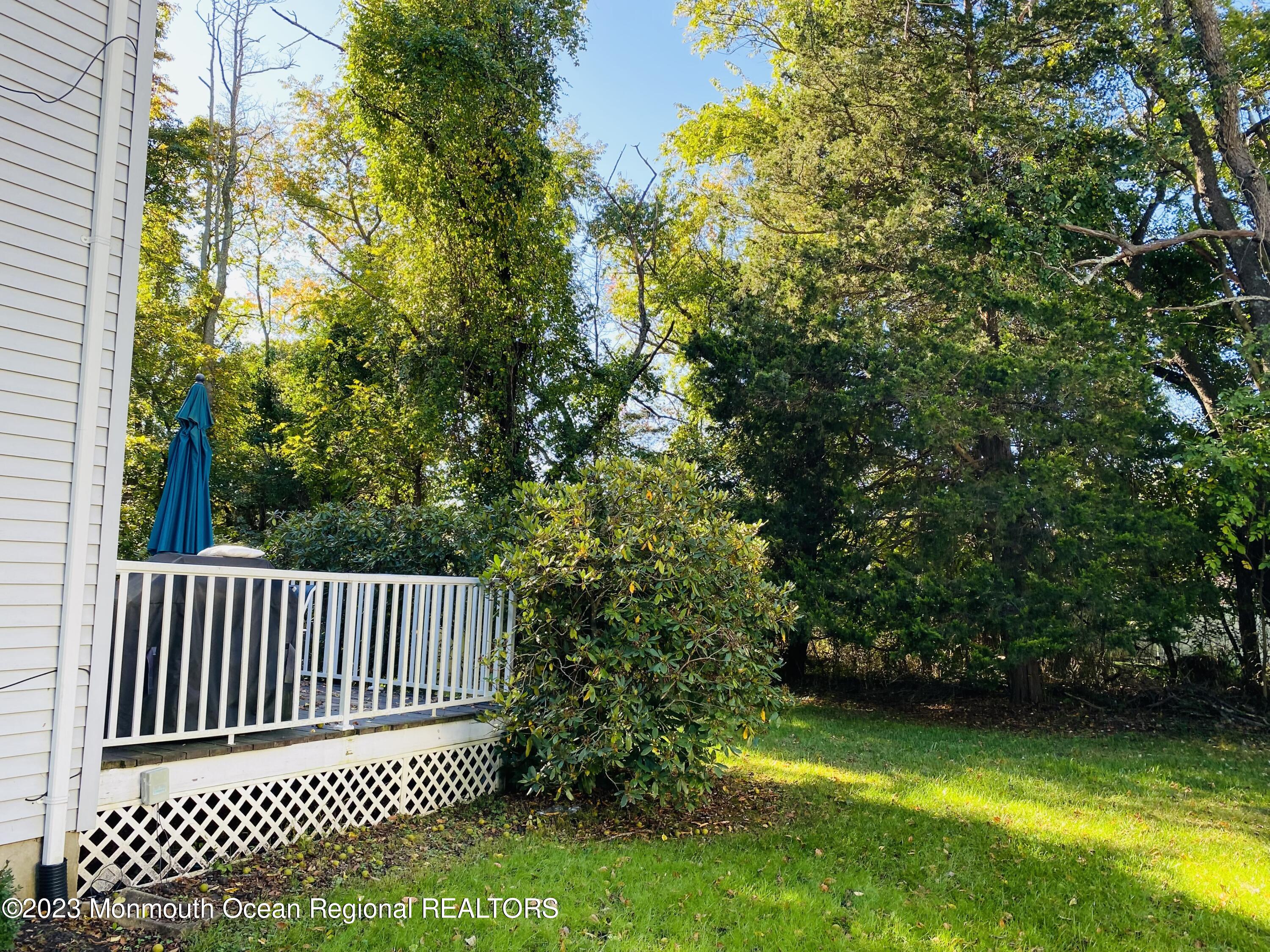 12 Spicy Pond Road Howell, NJ 07731 - Photo 14 of 19 a view of a porch with a yard