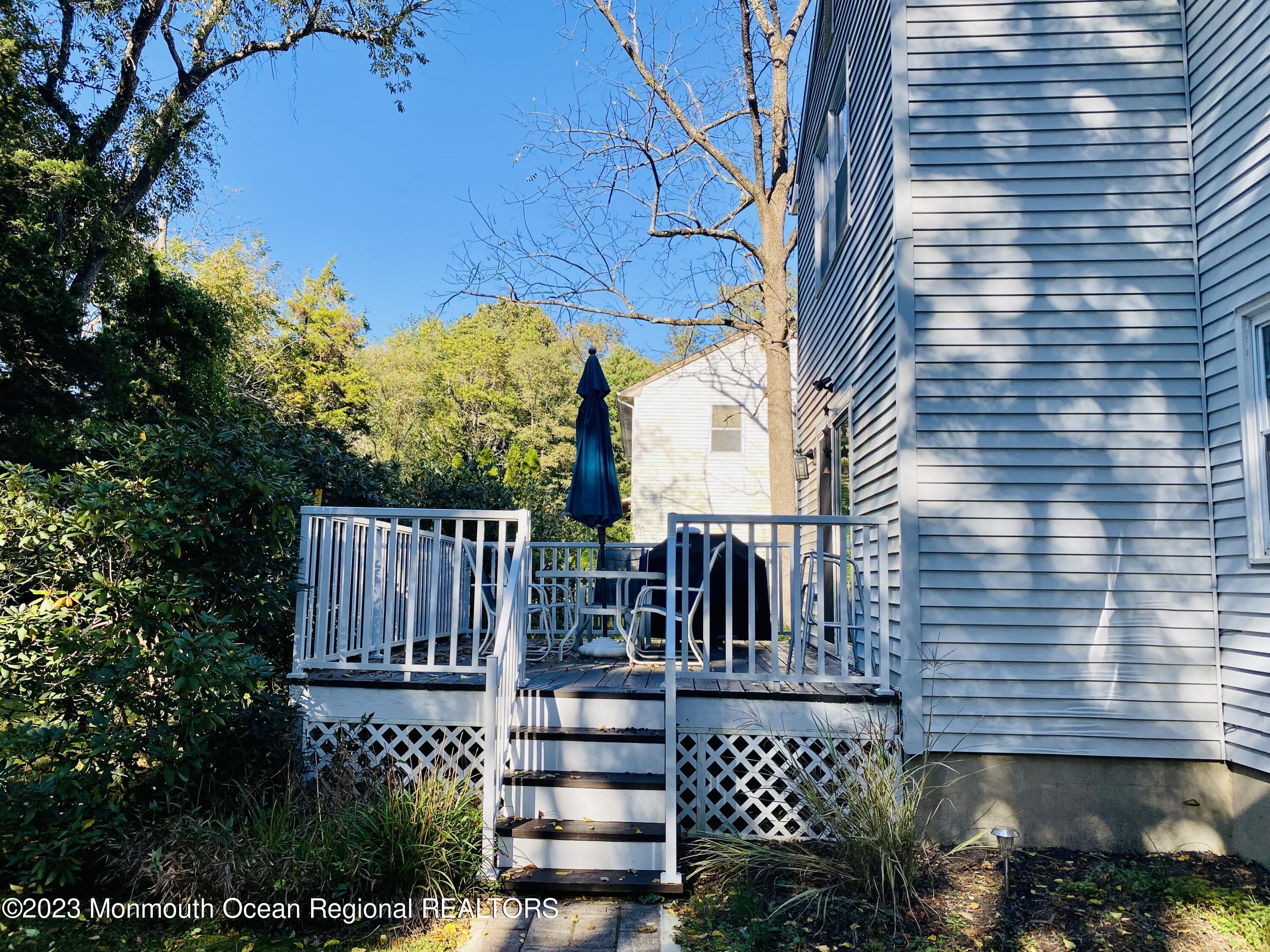 12 Spicy Pond Road Howell, NJ 07731 - Photo 18 of 19 a view of residential house with wooden fence