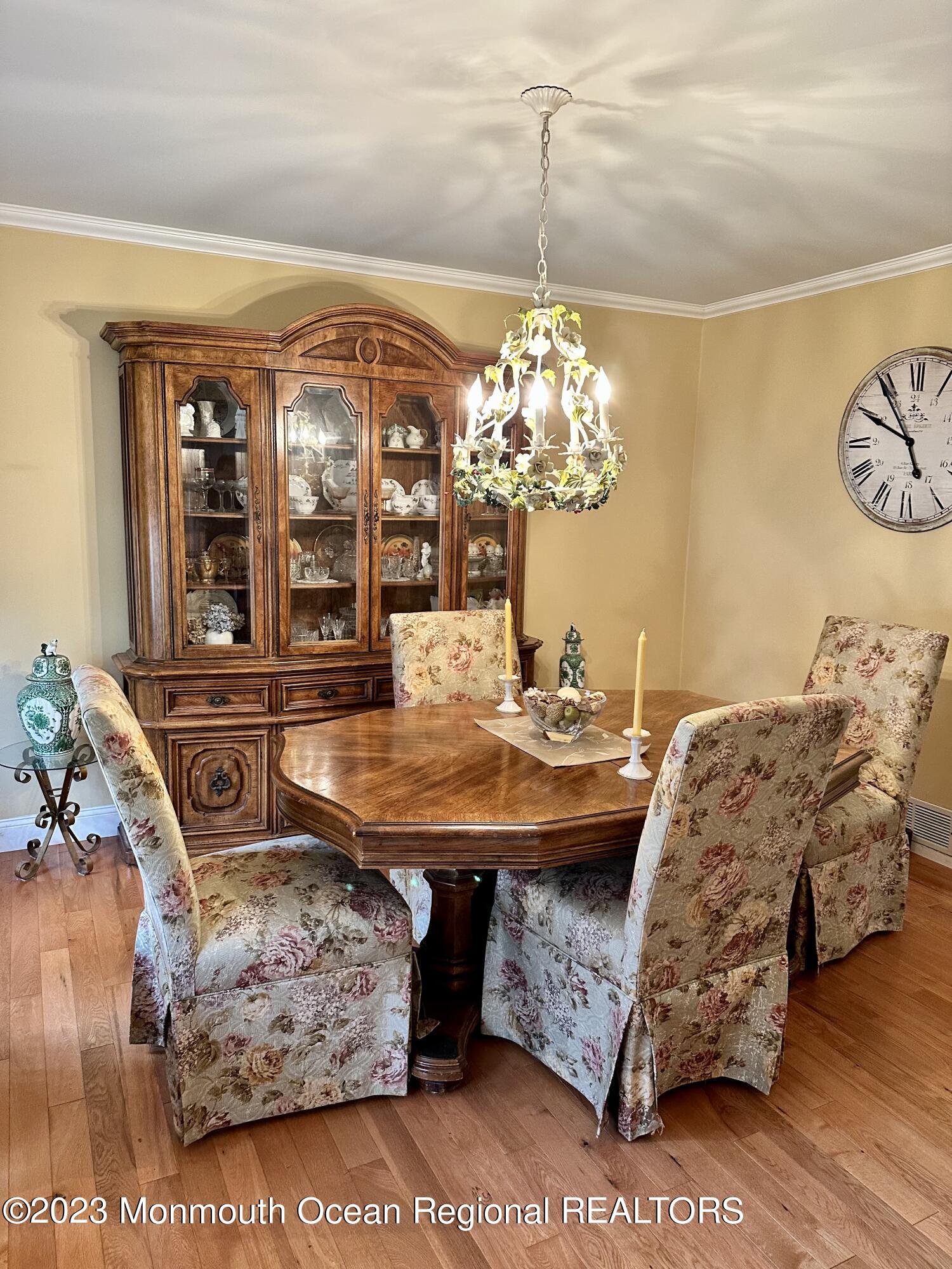 12 Spicy Pond Road Howell, NJ 07731 - Photo 9 of 19 a living room with furniture and chandelier