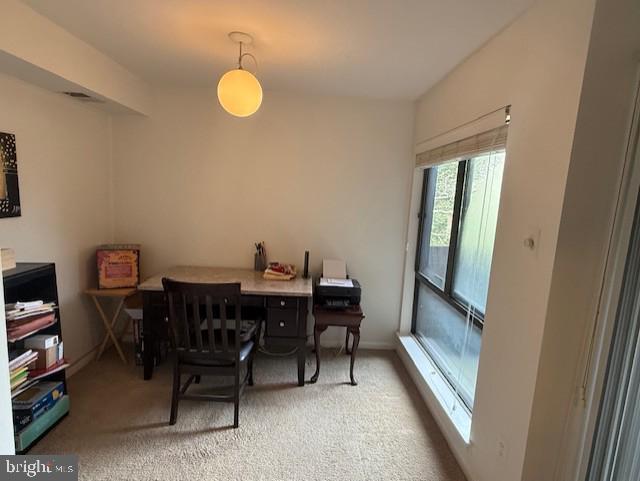 11260 Chestnut Grove Square, Unit 338 Reston, VA 20190 - Photo 9 of 18 a view of a workspace with furniture and a window