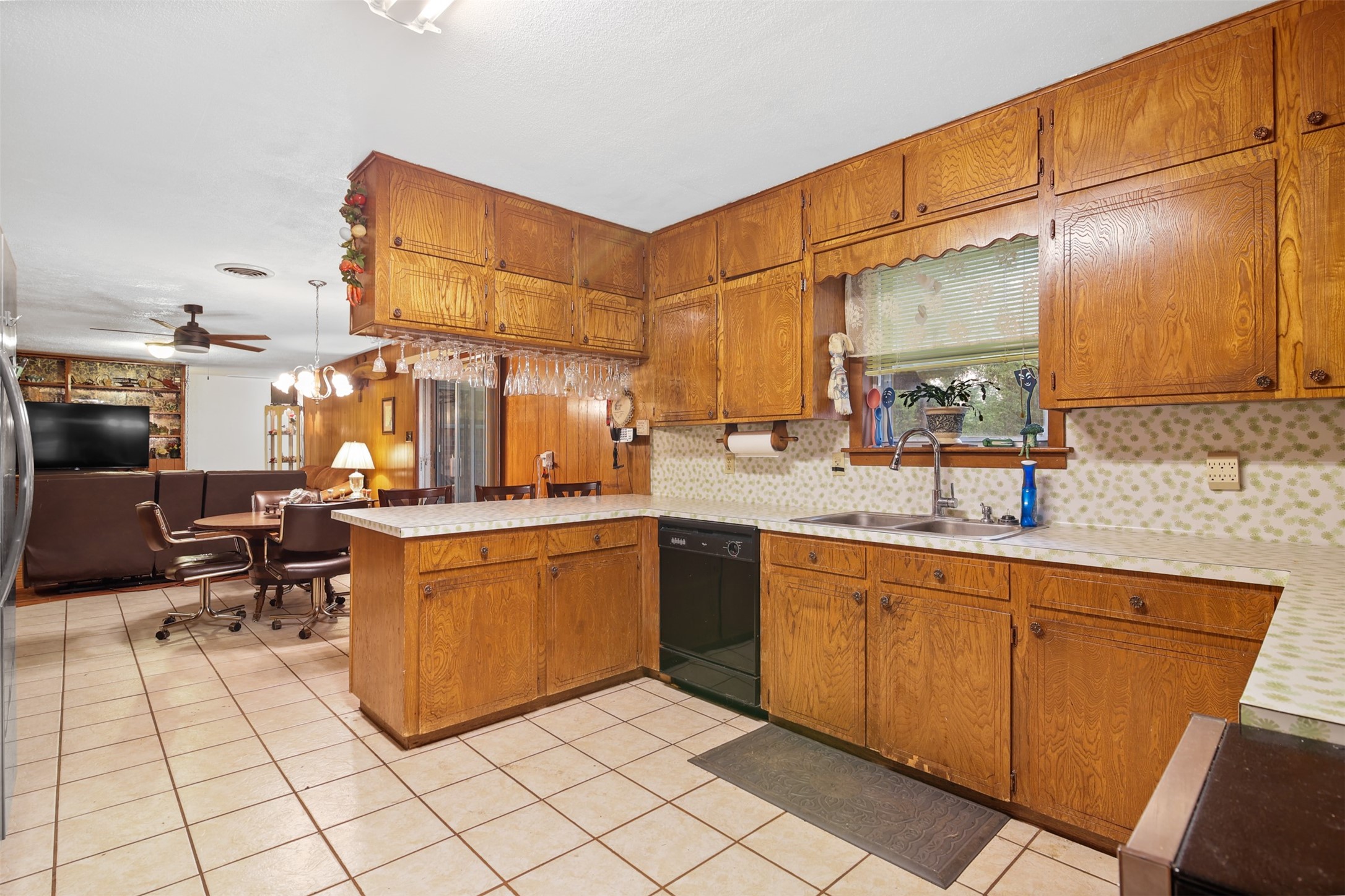 8406 East Mt Houston Road Houston, TX 77050 - Photo 8 of 30 a kitchen with cabinets and chairs