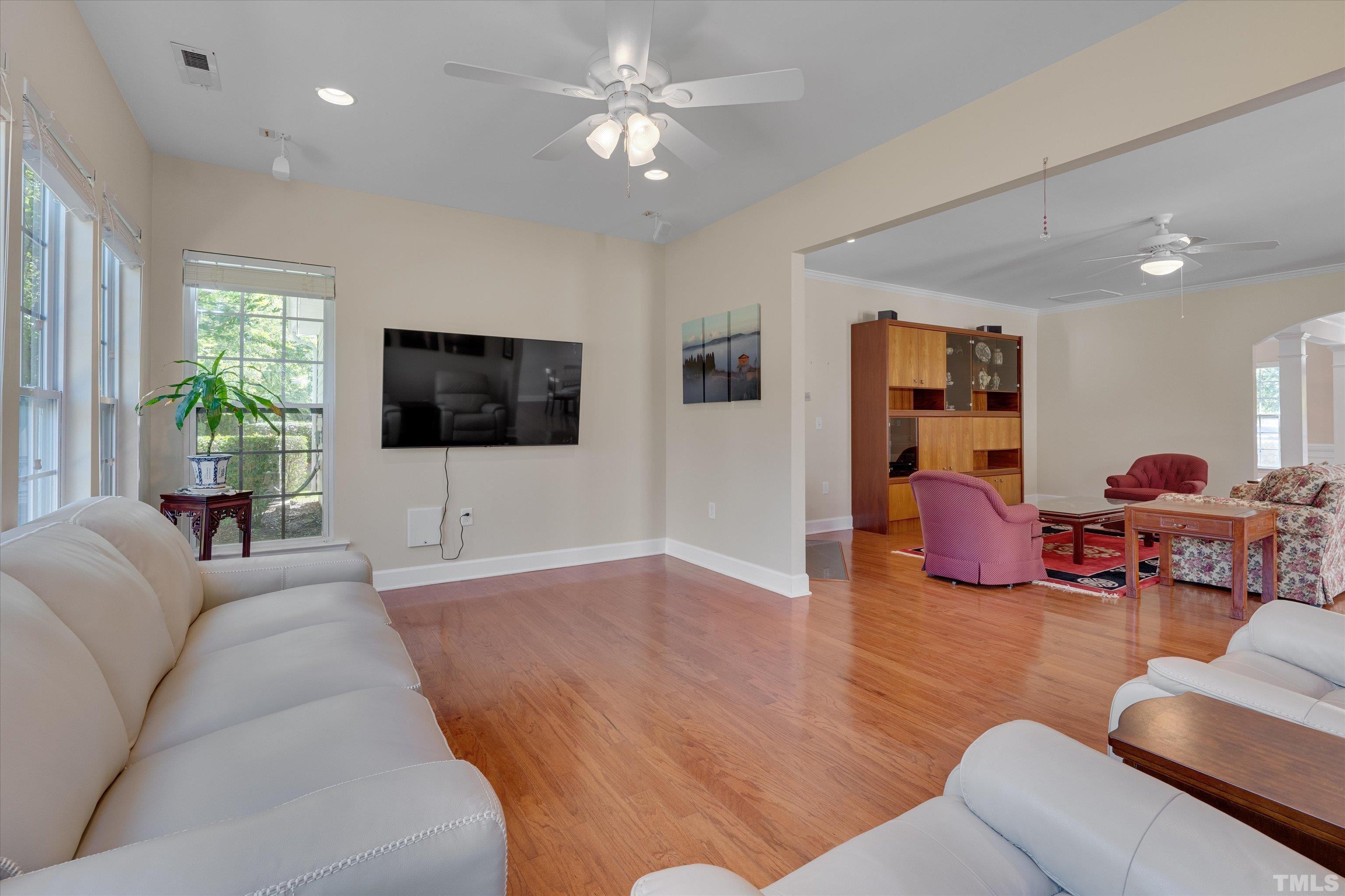 315 Beckingham Loop Cary, NC 27519 - Photo 13 of 34 a living room with furniture and a flat screen tv