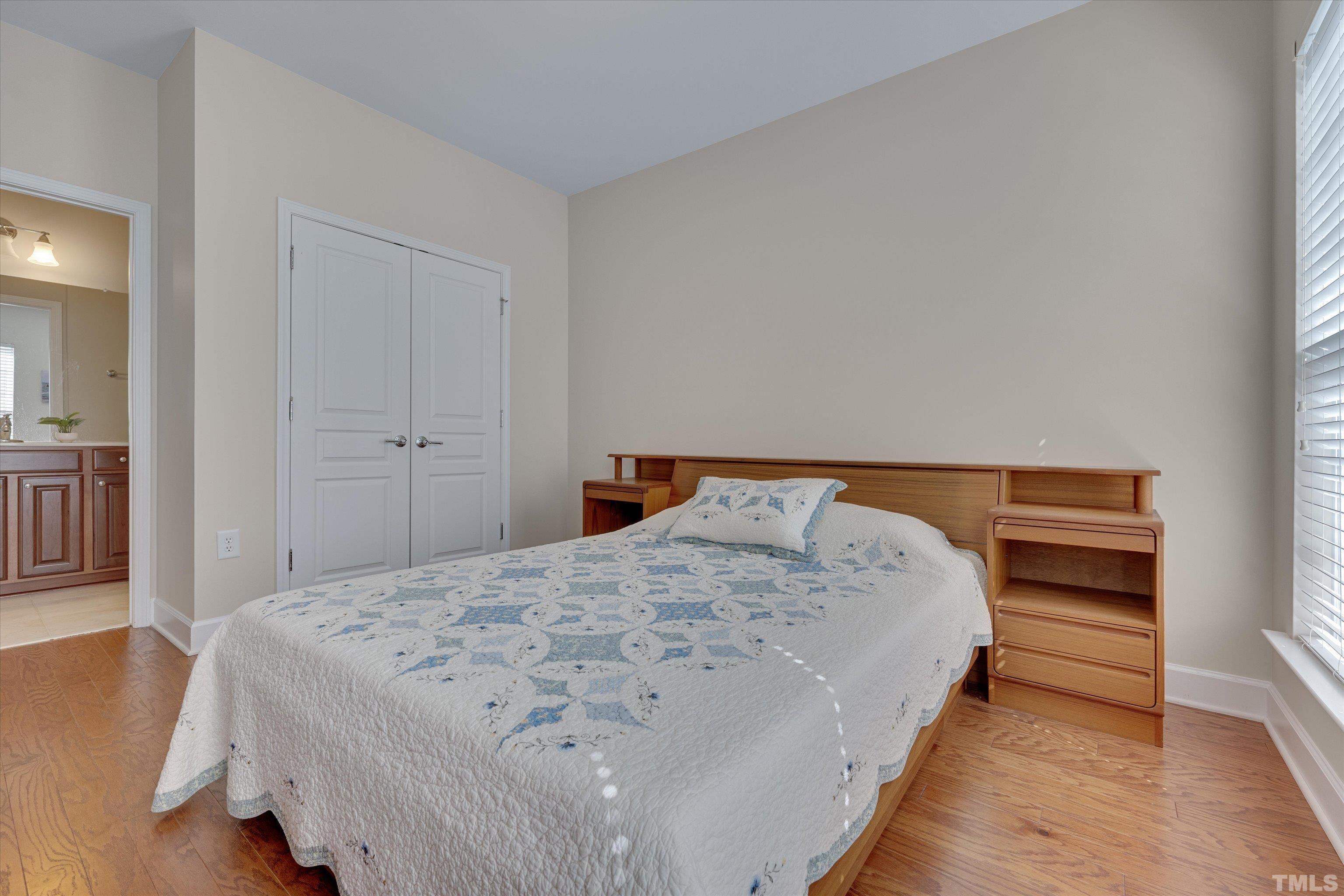 315 Beckingham Loop Cary, NC 27519 - Photo 24 of 34 a bedroom with a bed and cabinet