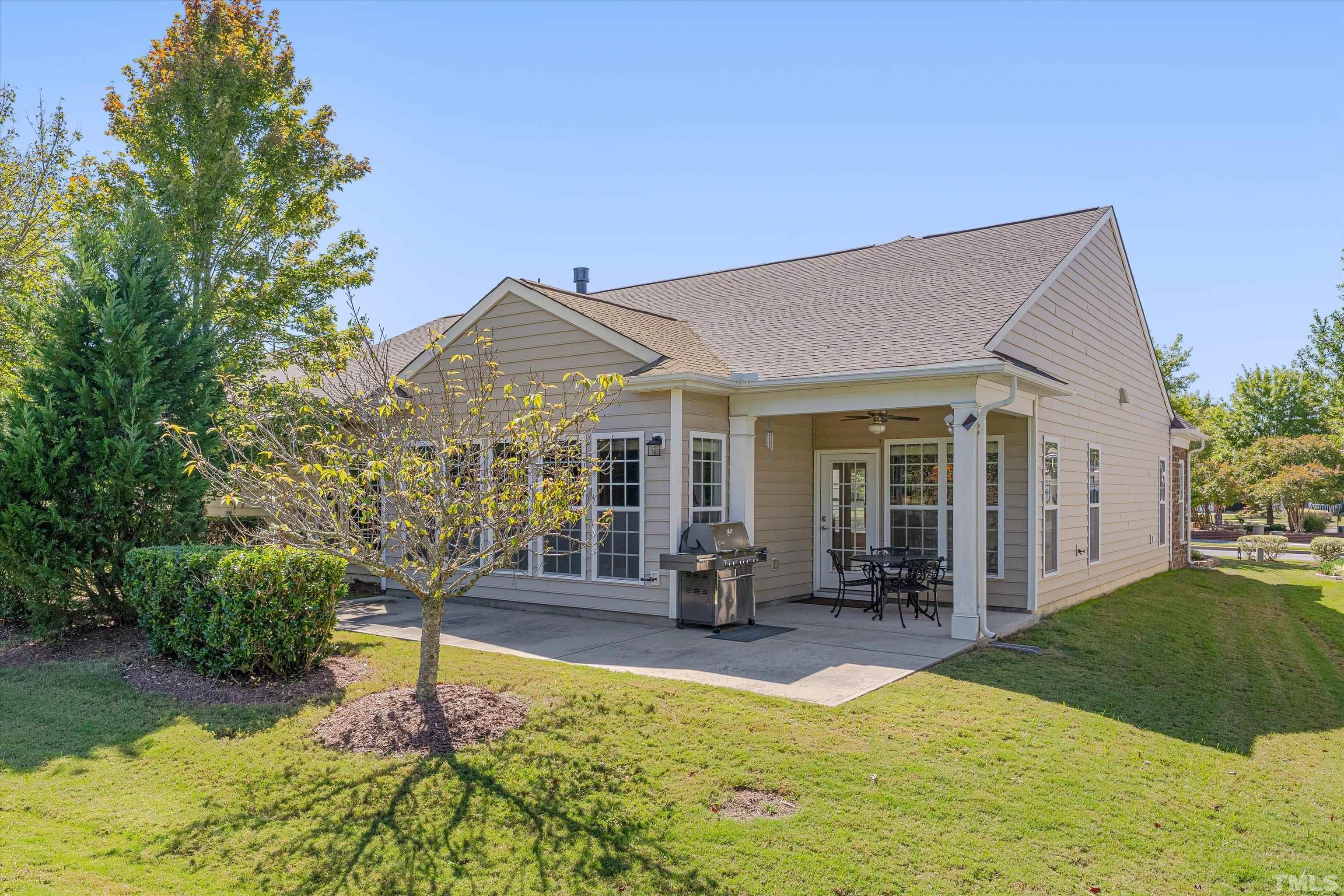 315 Beckingham Loop Cary, NC 27519 - Photo 30 of 34 a view of a house with backyard porch and sitting area