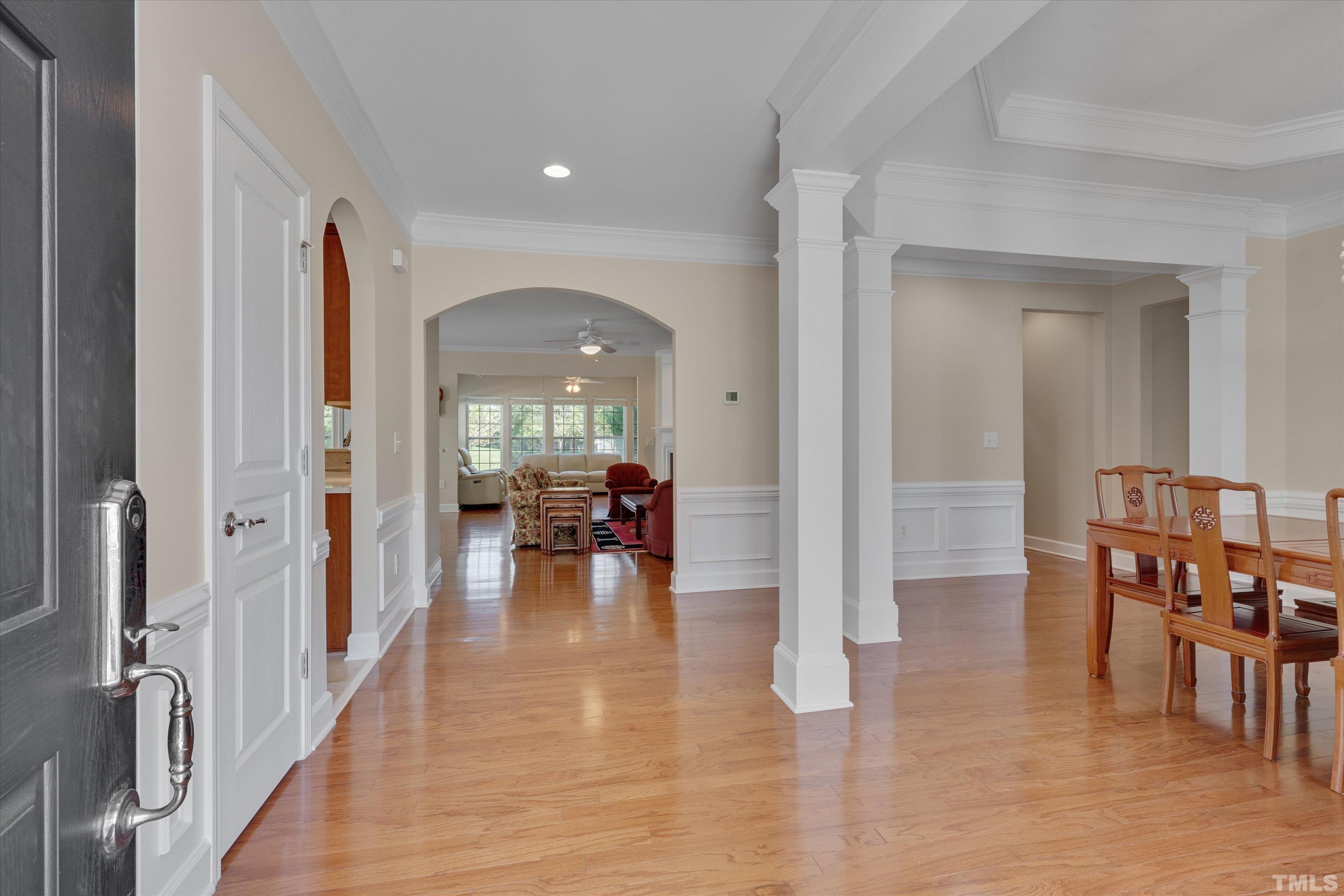 315 Beckingham Loop Cary, NC 27519 - Photo 3 of 34 wooden floor with dining room and livingroom view