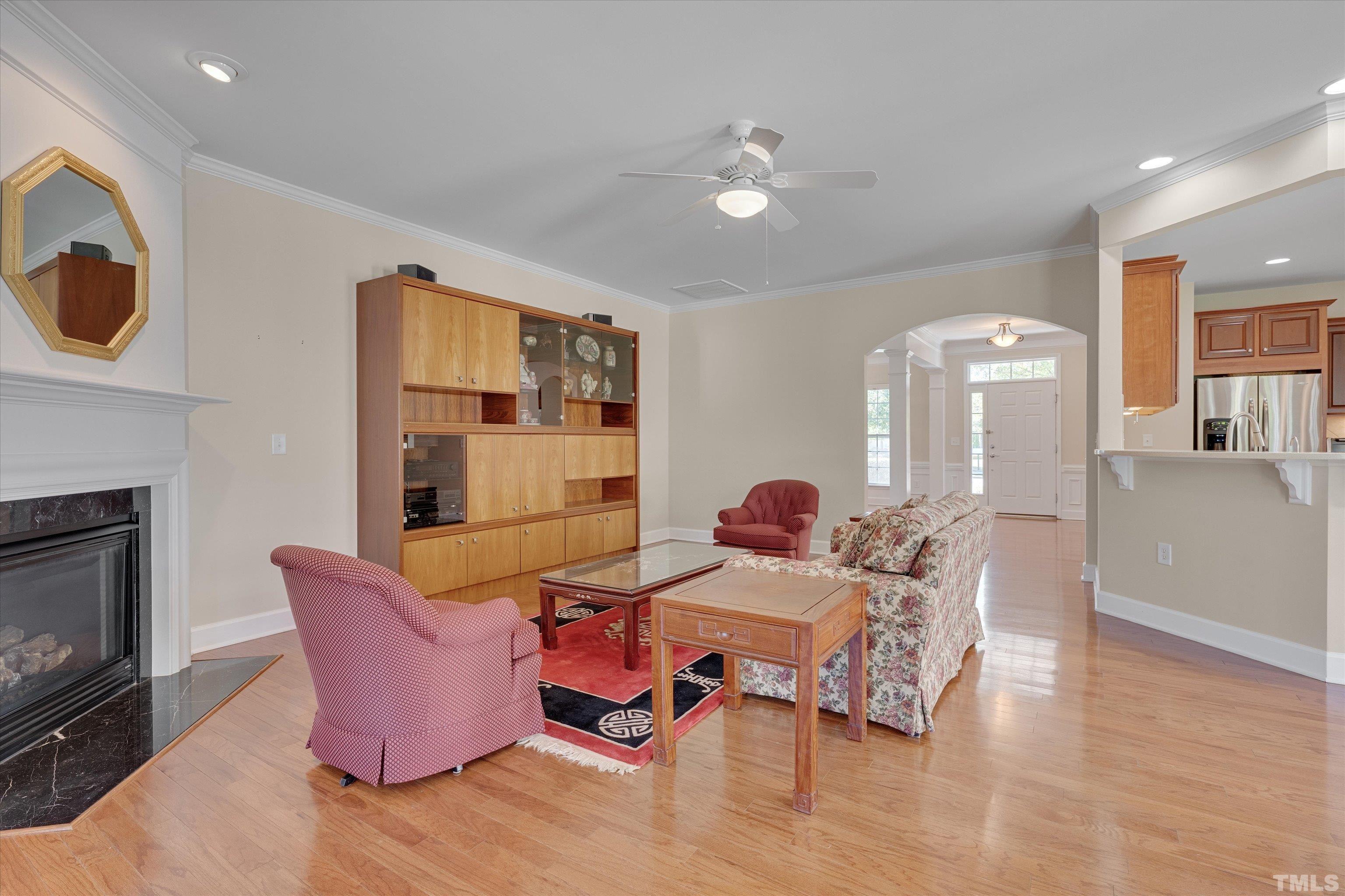315 Beckingham Loop Cary, NC 27519 - Photo 9 of 34 a living room with furniture and a fireplace