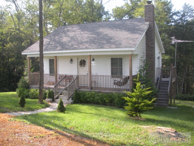 1457 Cornerstone Road Independence, VA 24348 - Photo 1 of 17 a view of a house with a yard and plants