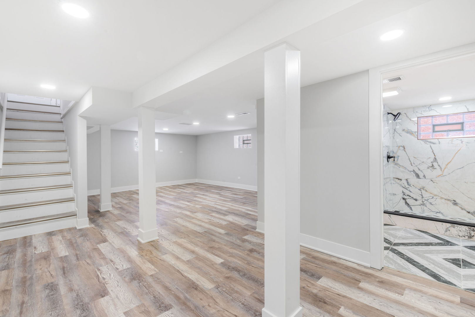 9633 South Yale Avenue Chicago, IL 60628 - Photo 20 of 26 a view of a hallway with wooden floor