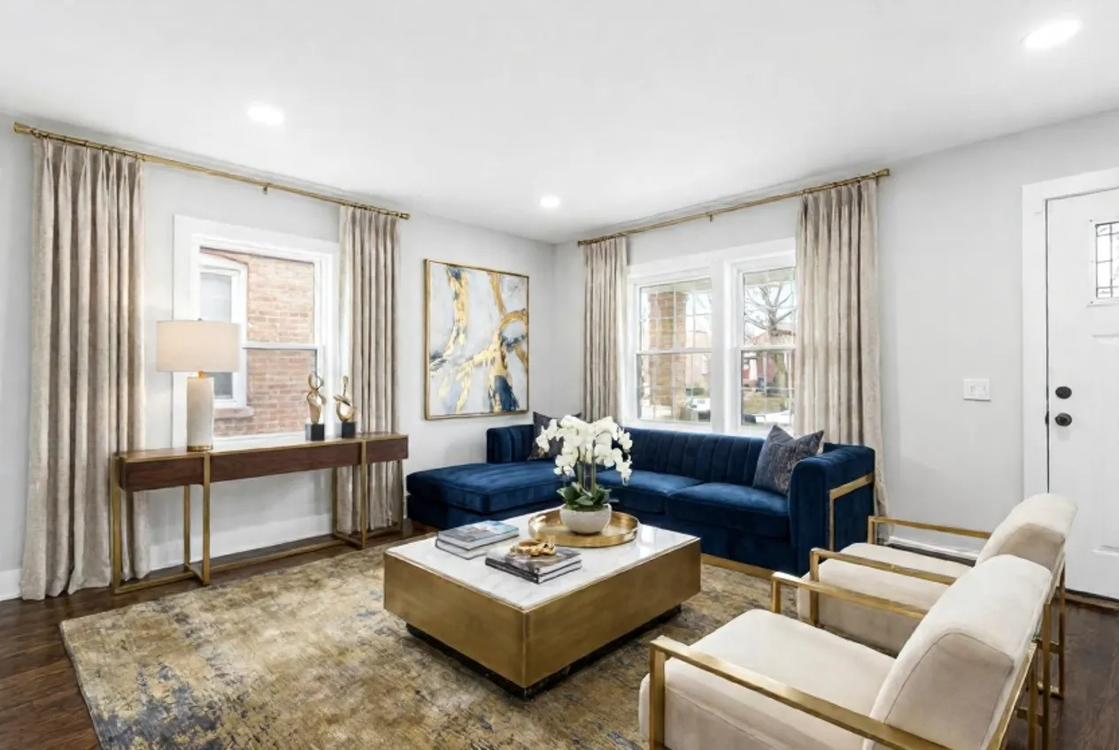 9633 South Yale Avenue Chicago, IL 60628 - Photo 2 of 26 a living room with furniture and a large window