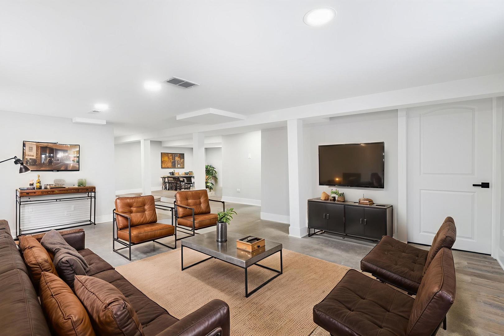 9633 South Yale Avenue Chicago, IL 60628 - Photo 21 of 26 a living room with furniture and a flat screen tv