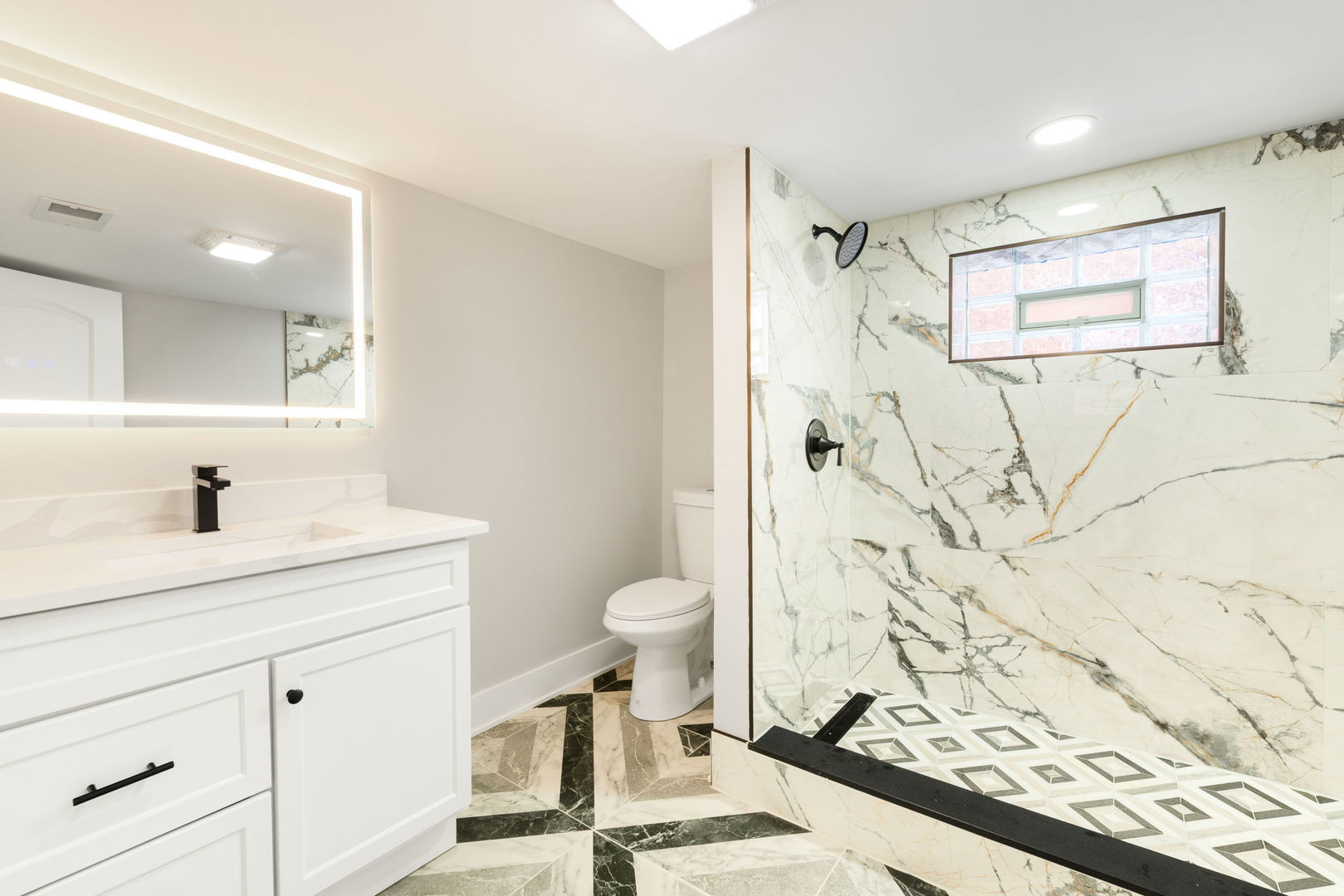 9633 South Yale Avenue Chicago, IL 60628 - Photo 23 of 26 a bathroom with a granite countertop sink toilet and shower