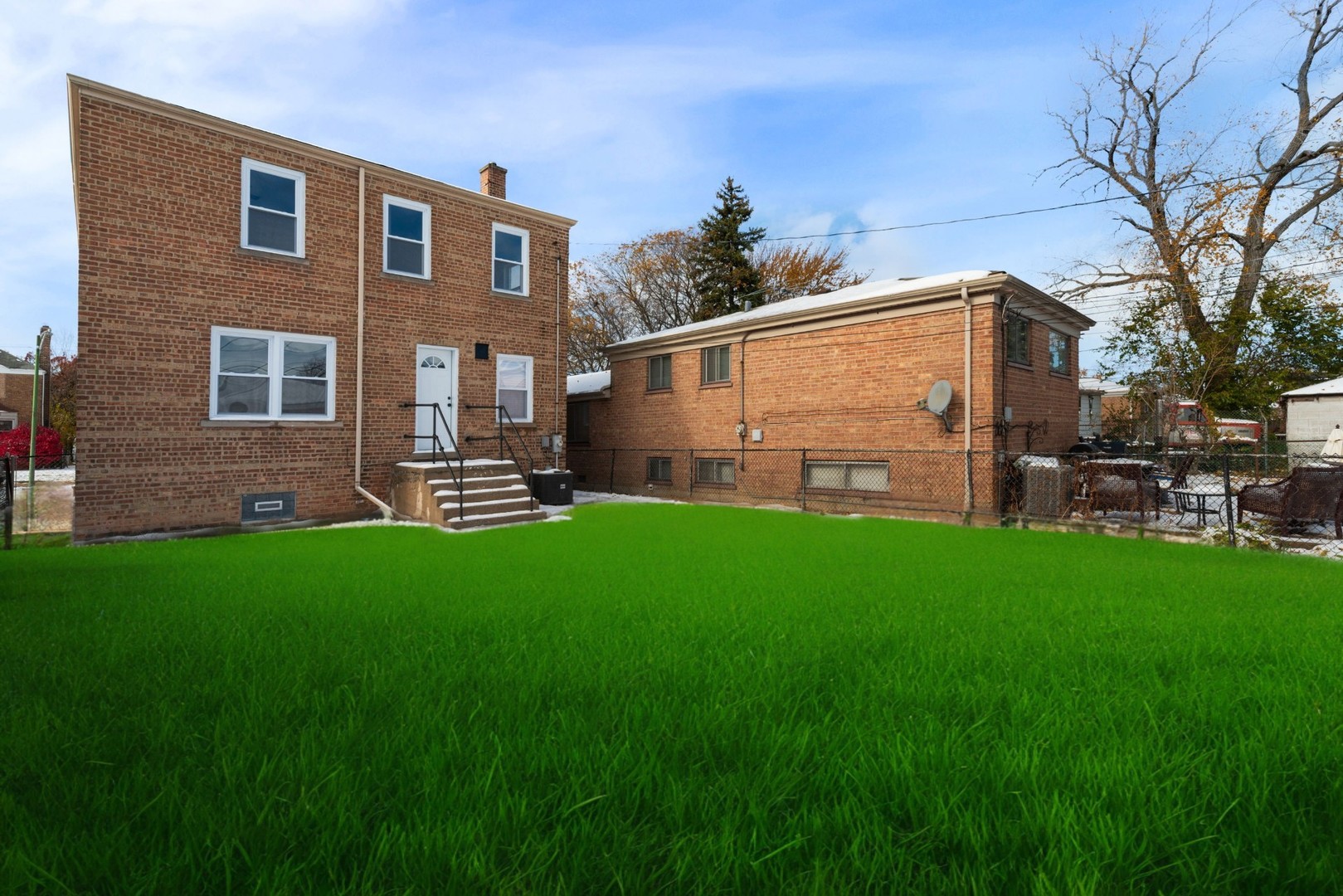 9633 South Yale Avenue Chicago, IL 60628 - Photo 24 of 26 a backyard of a house with lots of green space