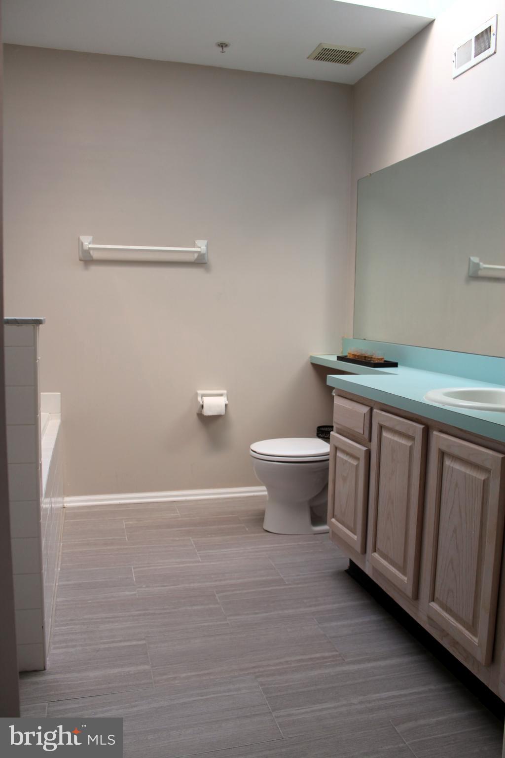 1408 Wharton Road Mount Laurel, NJ 08054 - Photo 17 of 23 a bathroom with a sink and a toilet