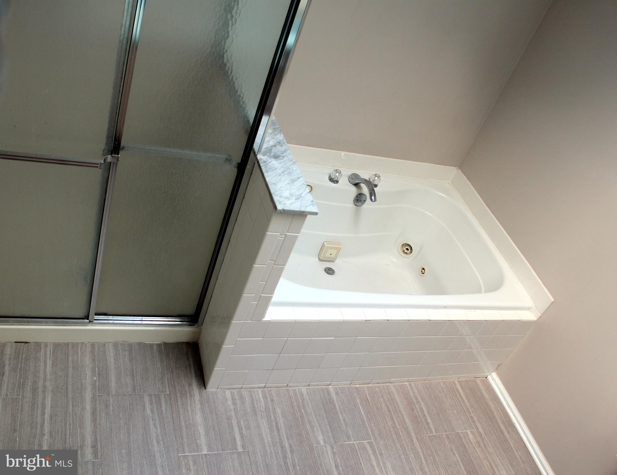 1408 Wharton Road Mount Laurel, NJ 08054 - Photo 20 of 23 a bathroom with a tub