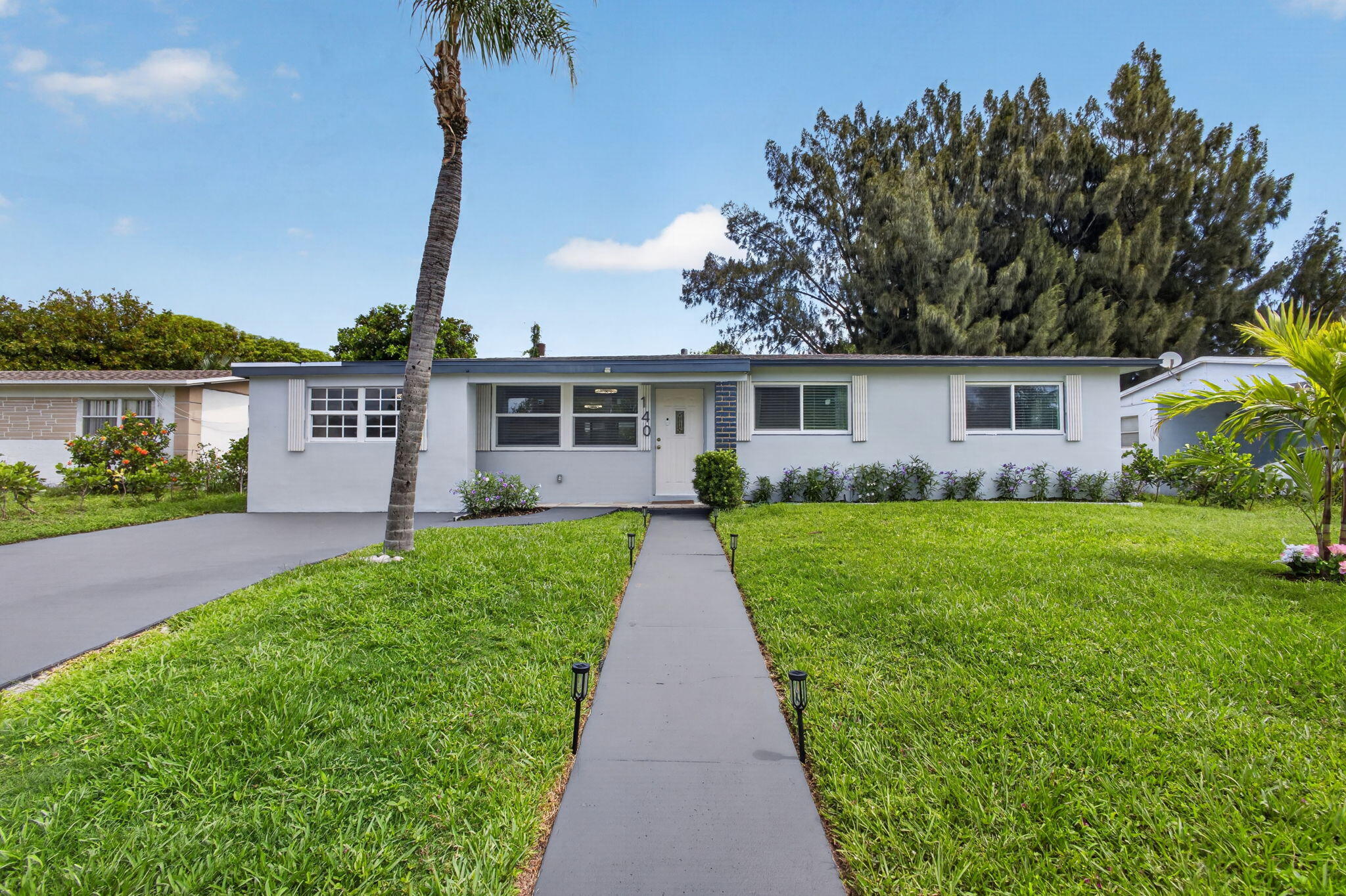 140 West 31st Court Riviera Beach, FL 33404 - Photo 2 of 59 3-web-or-mls-5D1A7349