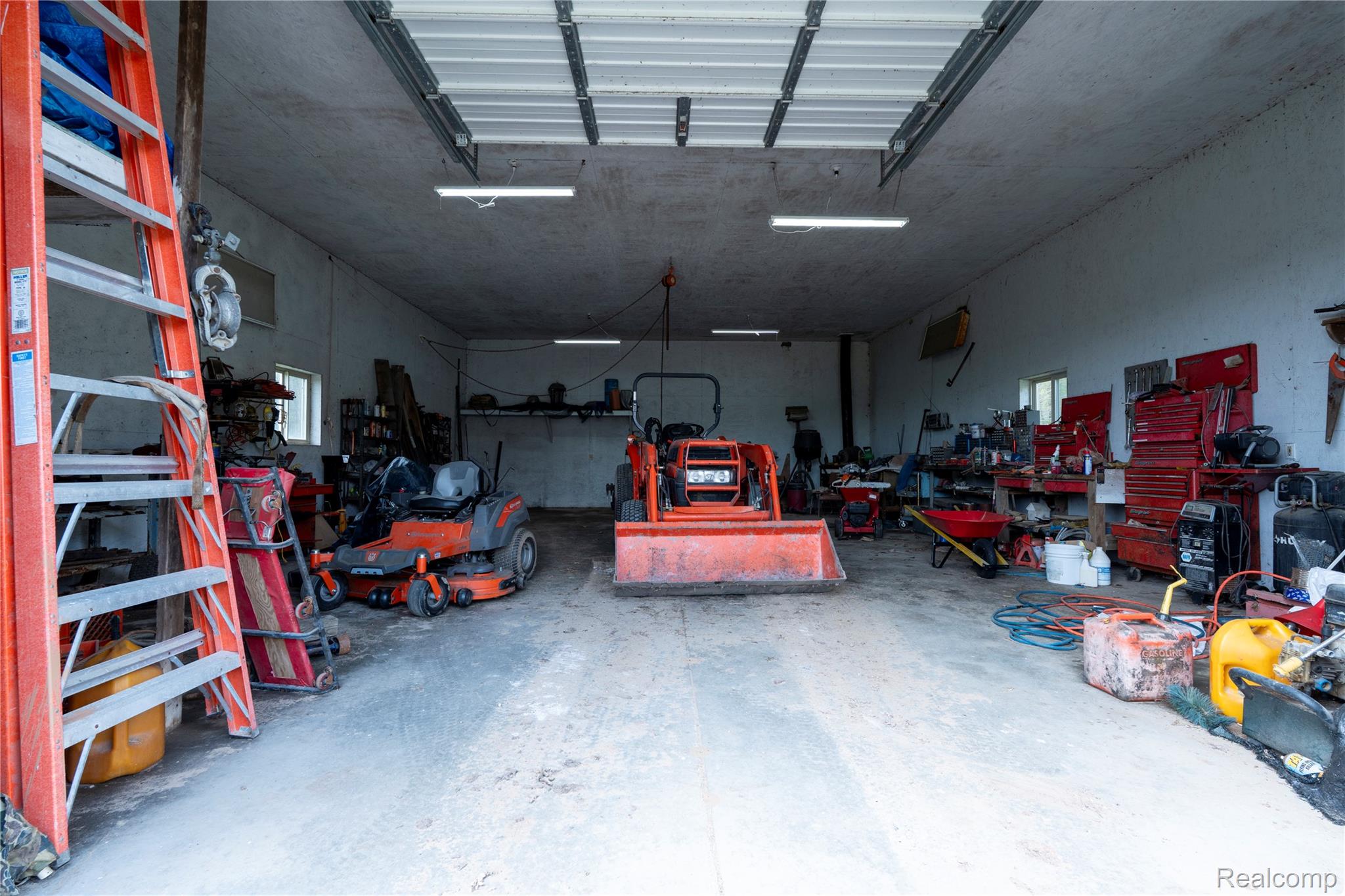 4180 Sage Lake Road Lupton, MI 48635 - Photo 28 of 40 View of garage