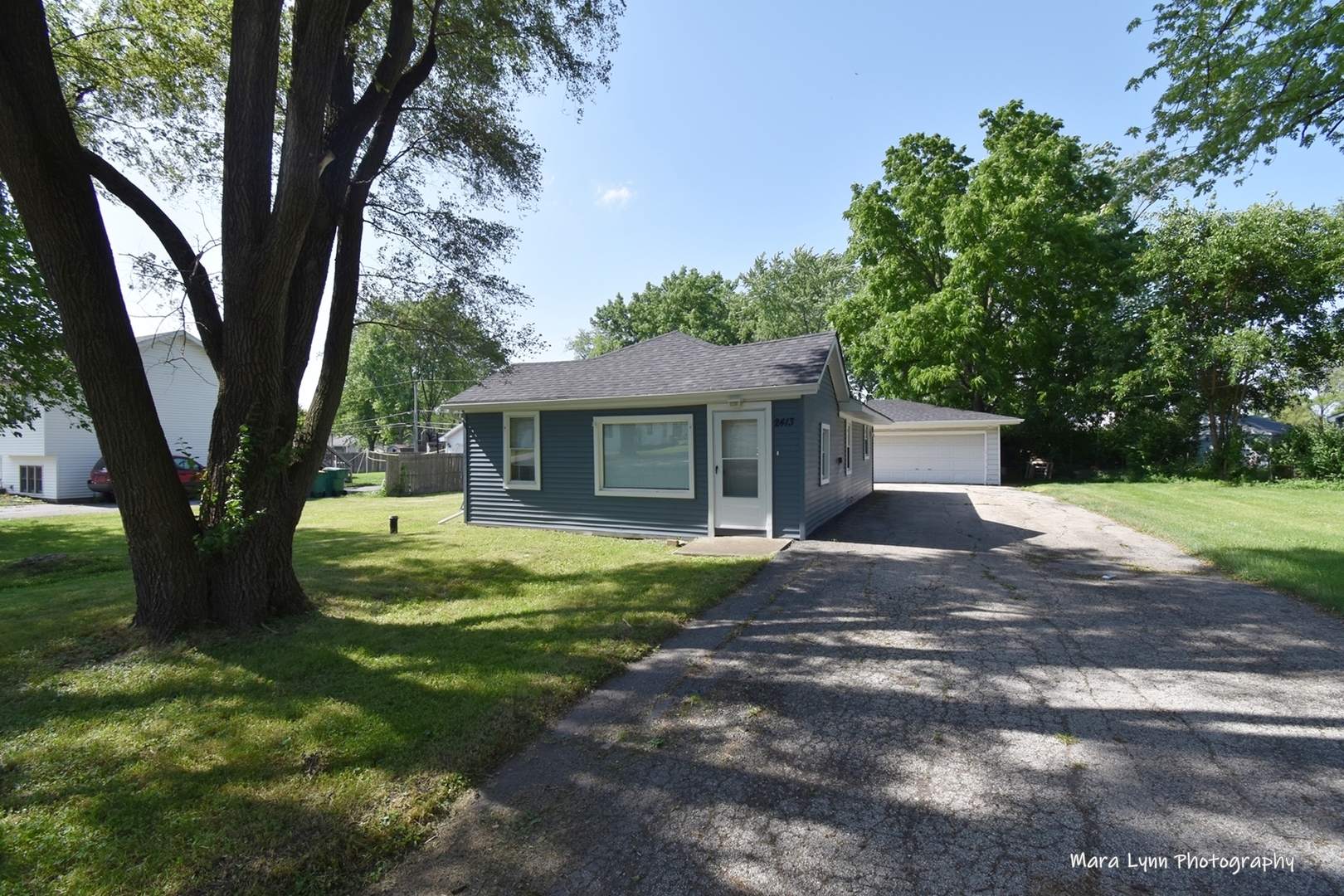 2413 Pecan Street Joliet, IL 60435 - Photo 1 of 14 a view of a house with a yard