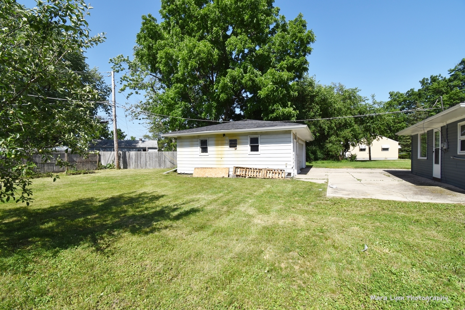 2413 Pecan Street Joliet, IL 60435 - Photo 12 of 14 a view of a house with backyard and sitting area