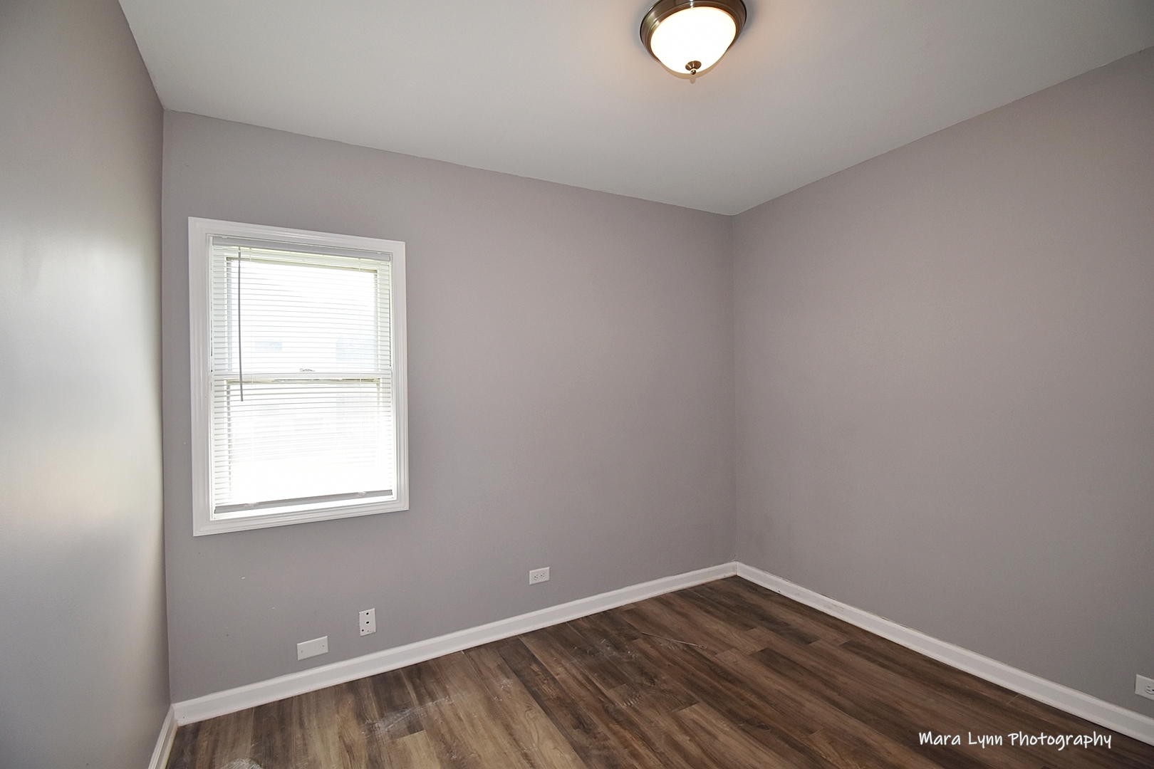 2413 Pecan Street Joliet, IL 60435 - Photo 8 of 14 an empty room with a window