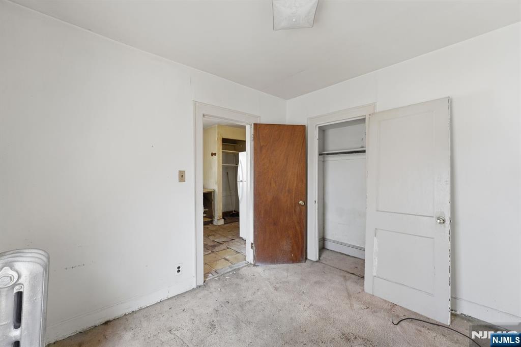 1024 Julia Street Elizabeth, NJ 07201 - Photo 16 of 30 an empty room with closet