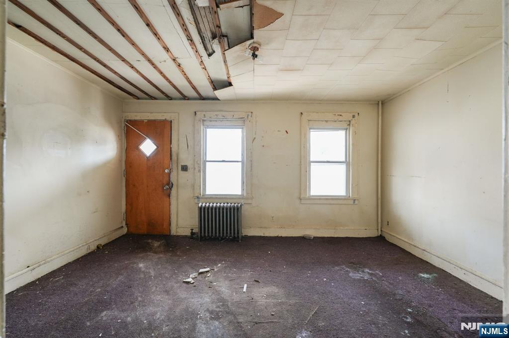 1024 Julia Street Elizabeth, NJ 07201 - Photo 24 of 30 an empty room with windows