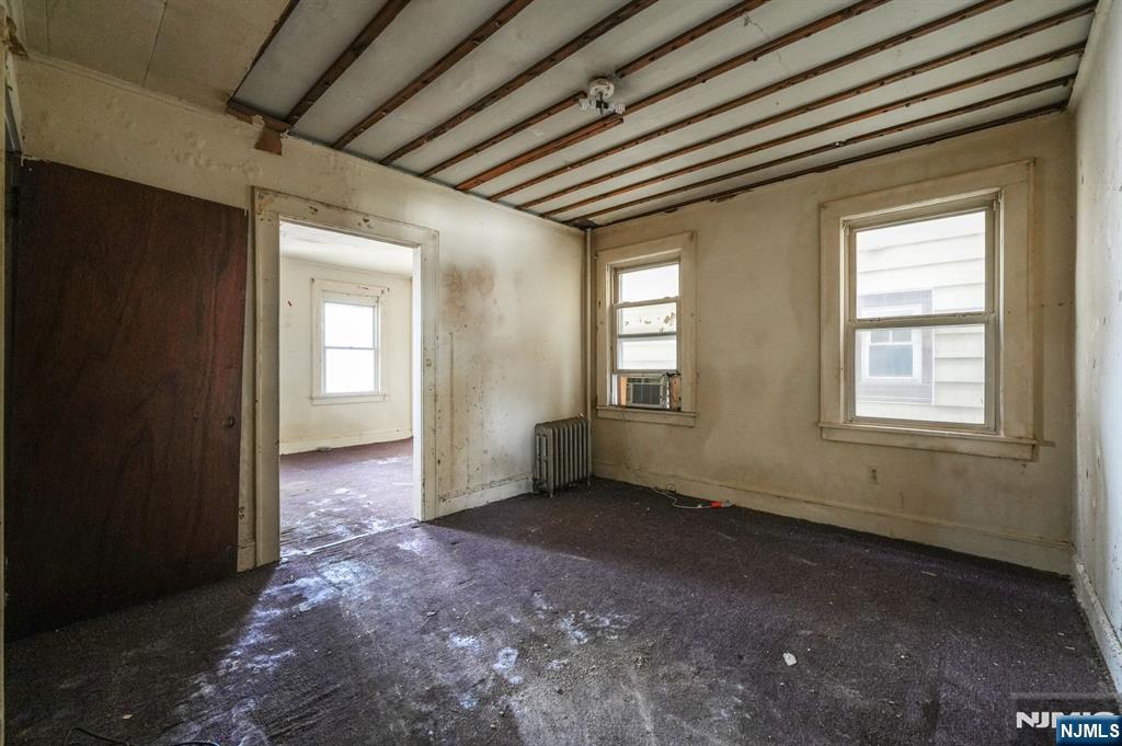 1024 Julia Street Elizabeth, NJ 07201 - Photo 26 of 30 a view of an empty room with windows