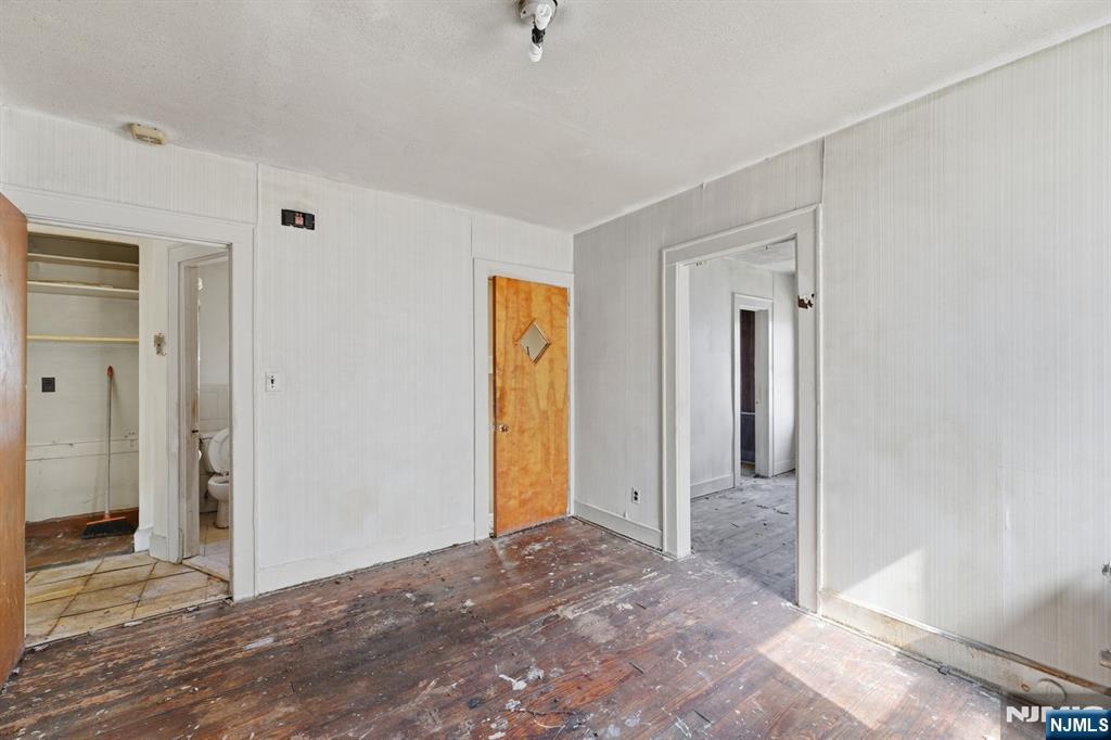 1024 Julia Street Elizabeth, NJ 07201 - Photo 8 of 30 a view of a room with wooden floor and bathroom