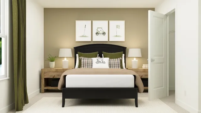 a bedroom with a bed a table and chair