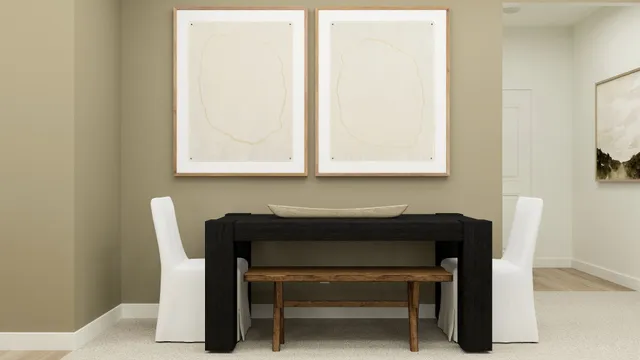 a table and chair in a small room