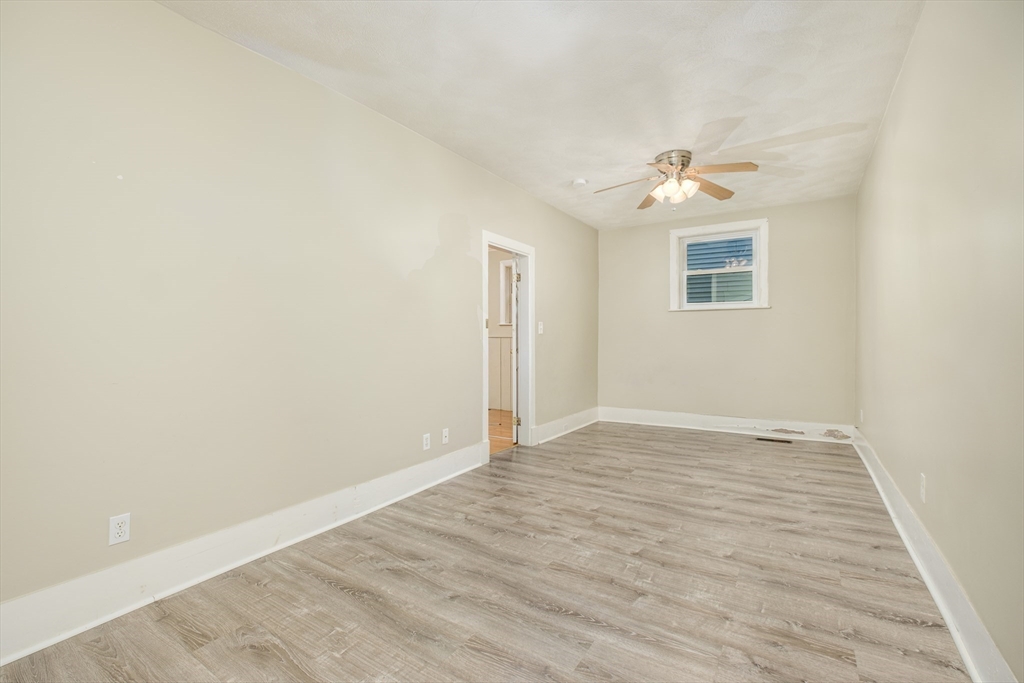 20 Hatch Street Everett, MA 02149 - Photo 8 of 16 a view of an empty room with a window