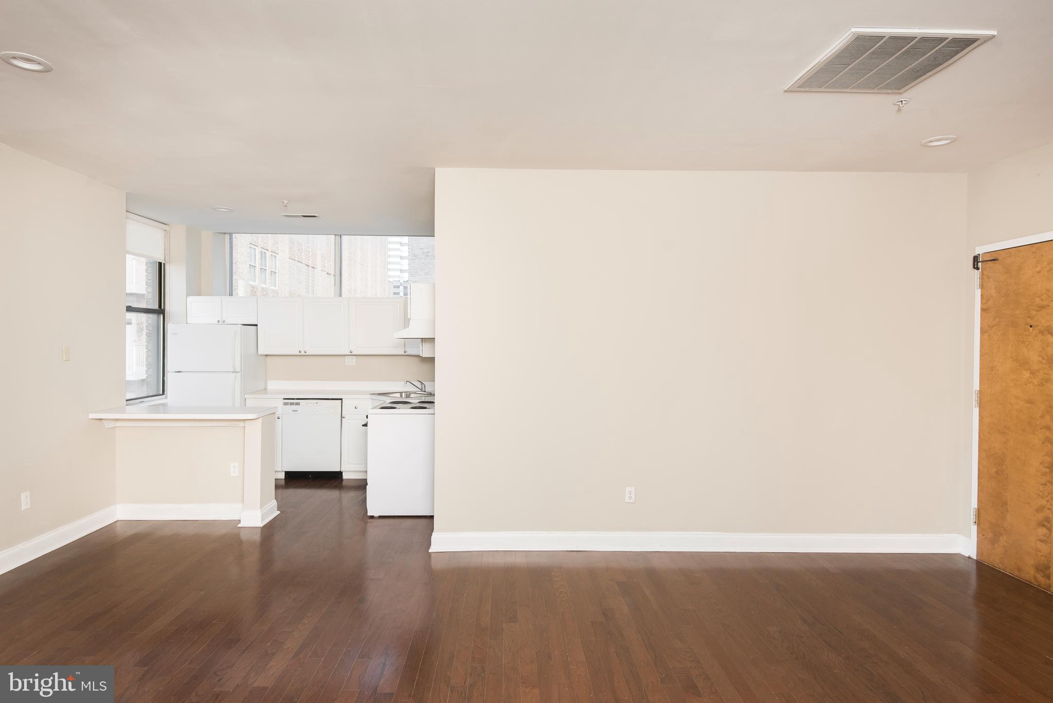 220 South 16th Street, Unit 1102 Philadelphia, PA 19102 - Photo 8 of 26 a view of kitchen with wooden floor