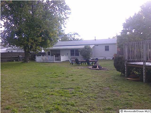 513 Alfred Road Toms River, NJ 08757 - Photo 3 of 3 a view of a house with a yard porch and sitting area