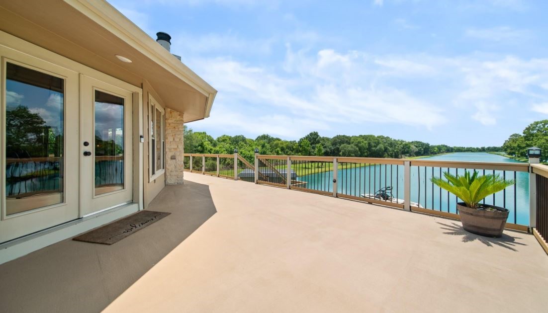 6714 Spray Lane, Unit C699A Rosharon, TX 77583 - Photo 34 of 48 3rd Floor Deck with the Best Views of the SKI TEXAS Lakes. Also, the Best Spot for Evening Sunsets with a Cool Beverage in hand.