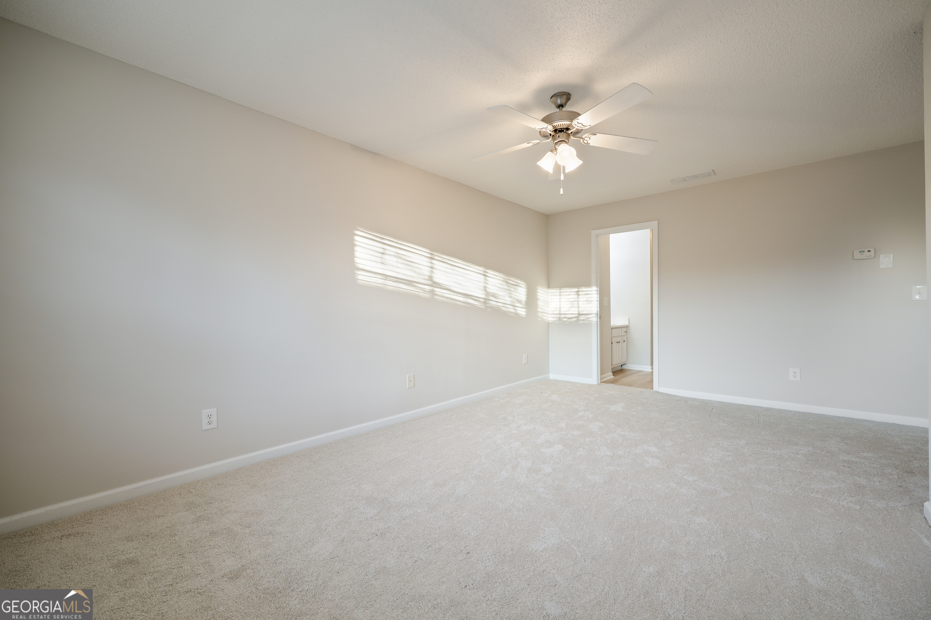 1442 Box Circle Winder, GA 30680 - Photo 15 of 25 a view of an empty room with a window