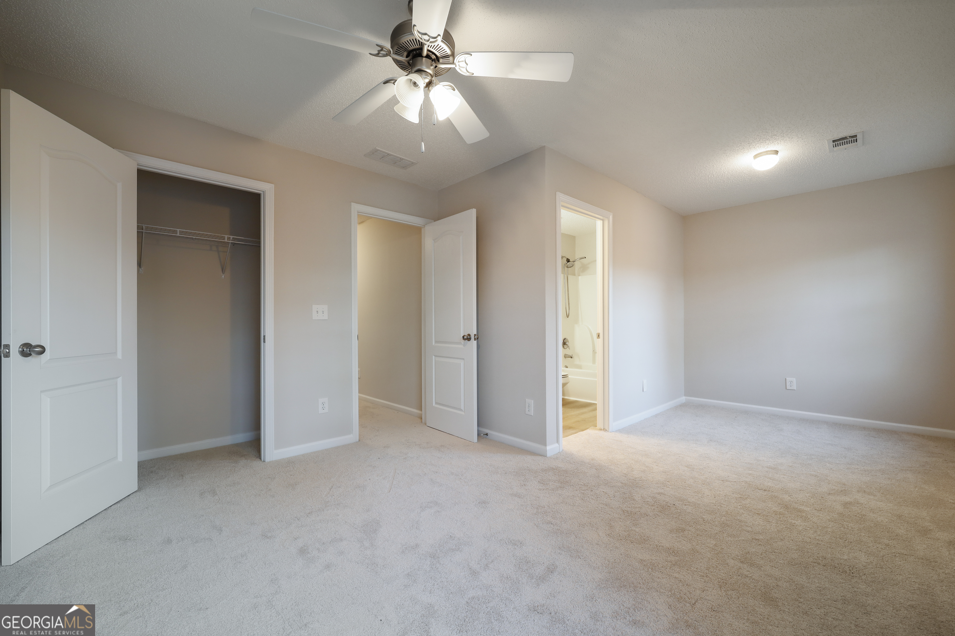 1442 Box Circle Winder, GA 30680 - Photo 18 of 25 an empty room with fan and entrance