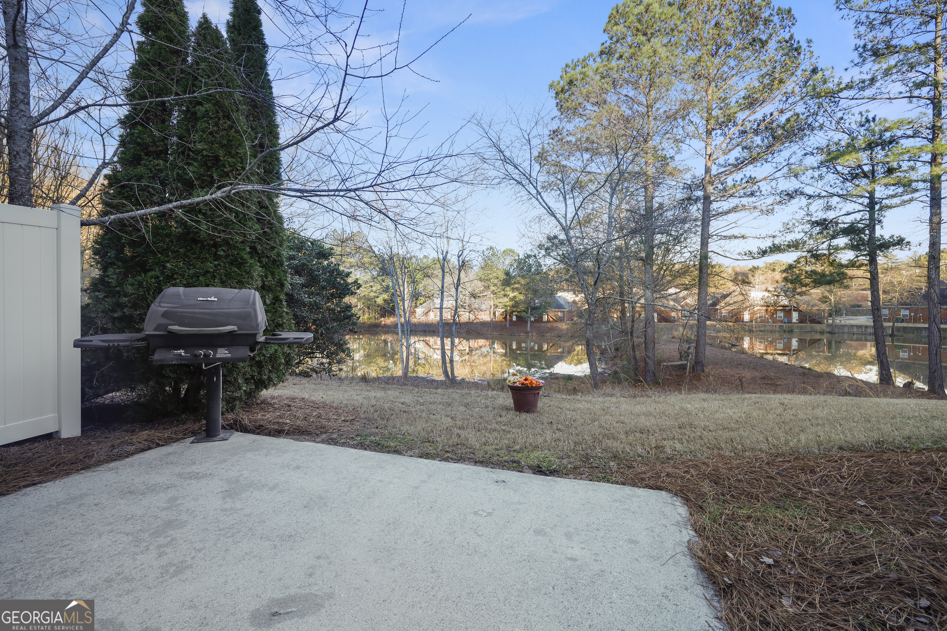 1442 Box Circle Winder, GA 30680 - Photo 23 of 25 a view of a yard with wooden fence