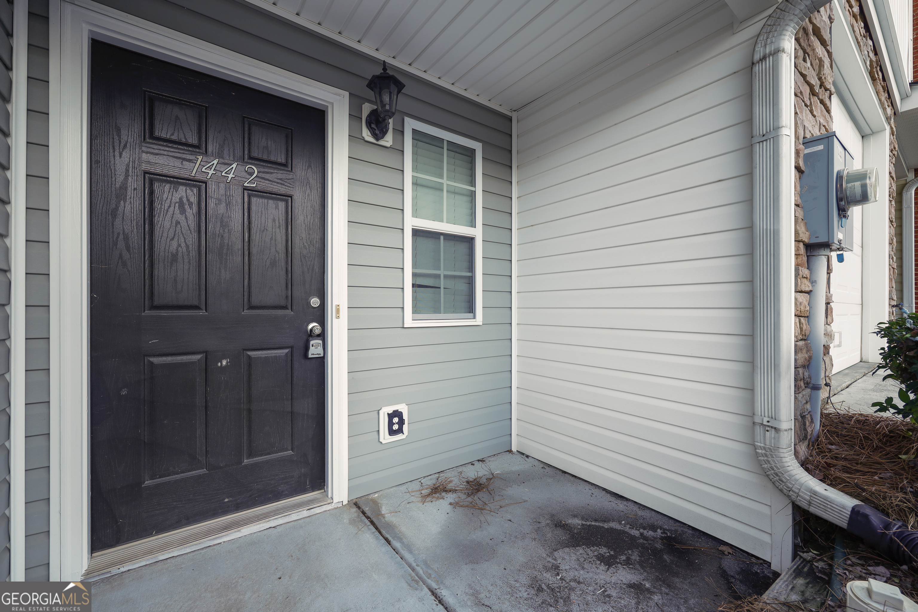 1442 Box Circle Winder, GA 30680 - Photo 24 of 25 a view of a house with a door and wooden door