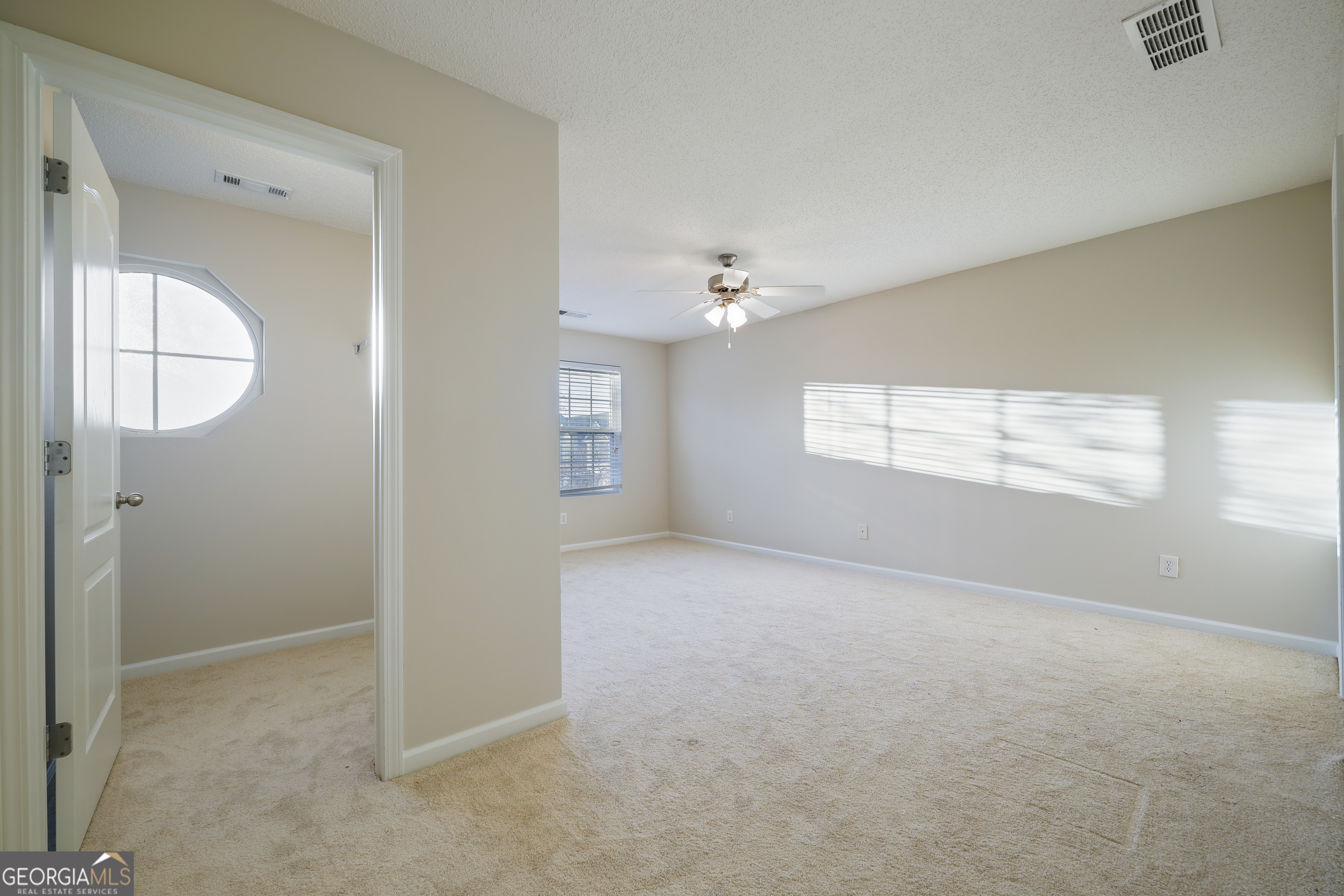 1442 Box Circle Winder, GA 30680 - Photo 10 of 25 a view of an empty room with a window