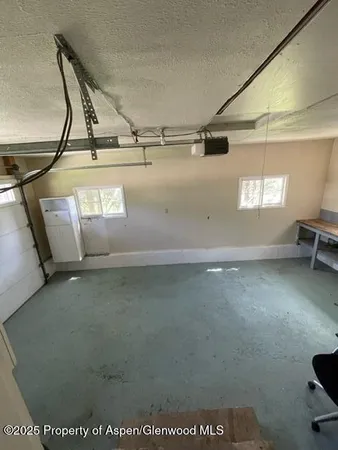 a view of a refrigerator in a kitchen