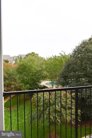 a view of a balcony with an outdoor space