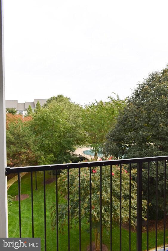 19609 Galway Bay Circle, Unit 303 Germantown, MD 20874 - Photo 16 of 22 a view of a balcony with an outdoor space