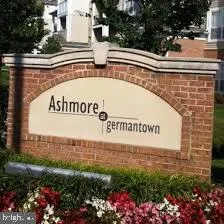 a sign broad in front of a building