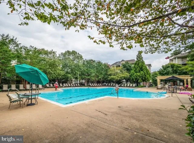 a view of a playground with basketball court